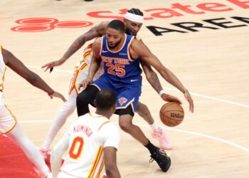 Nickeil Alexander-Walker steals the ball from Mikal Bridgets during the Knicks' 114-98 Game 4 win over the Hawks on April 25, 2026 in Atlanta.