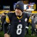 Pittsburgh Steelers quarterback Aaron Rodgers (8) walks off the field.