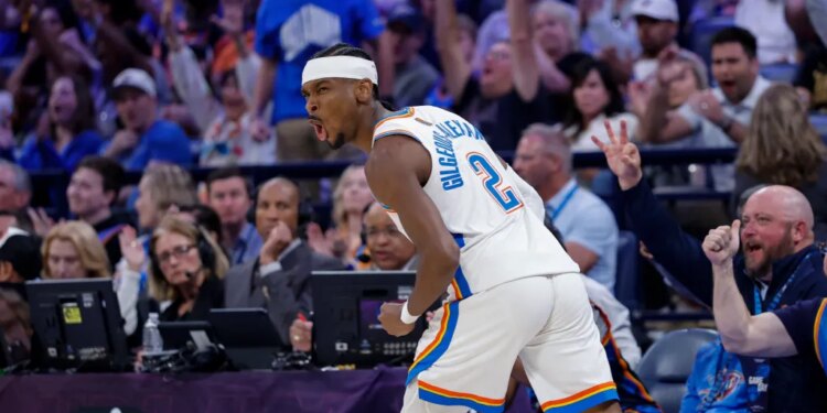 Oklahoma City Thunder guard Shai Gilgeous-Alexander (2) celebrates after scoring against the New York Knicks during the second half at Paycom Center.