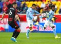 Maxi Moralez, who had three assists, makes a play as Robert Voloder defends during the first half of NYCFC's 3-1 win over the Red Bulls on April 29, 2026 in Harrison, N.J.