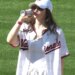 Nationals fan Sorcha Lewis celebrates her 21st birthday with a ceremonial "first sip" of beer on the mound on April 4, 2026.