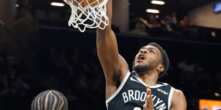 Day'ron Sharpe #20 of the Brooklyn Nets slams the ball during the first half when the Brooklyn Nets played the Dallas Mavericks Tuesday, February 24, 2026 at Barclays Center