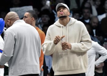 Giannis Antetokounmpo, who did not play, looks on during the Nets' 96-90 win over the Bucks on April 7, 2026 at Barclays Center.