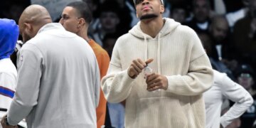 Giannis Antetokounmpo, who did not play, looks on during the Nets' 96-90 win over the Bucks on April 7, 2026 at Barclays Center.