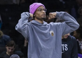 Nic Claxton, who did not play, celebrates after one of the few good plays by the tanking Nets' in their 123-94 loss to the Pacers on April 9, 2026 at Barclays Center.
