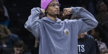 Nic Claxton, who did not play, celebrates after one of the few good plays by the tanking Nets' in their 123-94 loss to the Pacers on April 9, 2026 at Barclays Center.
