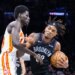 Nets center Nic Claxton (33) drives against Atlanta Hawks forward Mouhamed Gueye (18) during the first half at Barclays Center, Friday, April 3, 2026, in Brooklyn, NY.