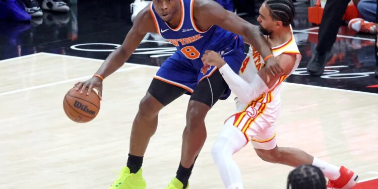OG Anunoby backs down Gabe Vincent during the Knicks 114-98 Game 4 win over the Hawks on April 25, 2026 in Atlanta.