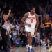 New York Knicks player Og Anunoby #8 reacts after a three-point shot in a game against the Atlanta Hawks at Madison Square Garden.