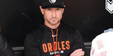Baltimore Orioles manager Craig Albernaz talks to media in the dugout before a baseball game against the Chicago White Sox in Chicago, Wednesday, April 8, 2026.