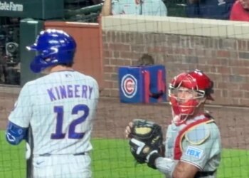 A rat sits on top of a Cubs ball bag near the Phillies dugout on April 21, 2026.