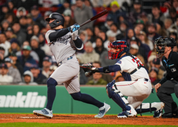 Randal Grichuk rips an RBI double in the eighth inning of the Yankees' 4-0 win over the Red Sox on April 21, 2026 at Fenway Park.
