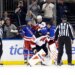 New York Rangers Igor Shesterkin and New Jersey Devils Jacob Markstrom in a scuffle on the ice.