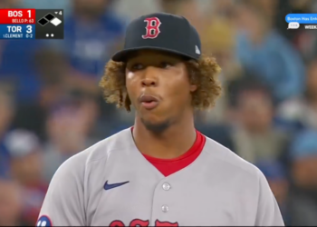 A baseball player, Brayan Bello, standing on the field. Boston 1, Toronto 3.