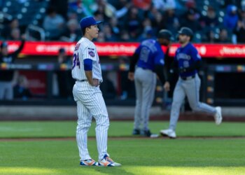 New York Mets pitcher Kodai Senga reacts on the mound after giving up a home run.