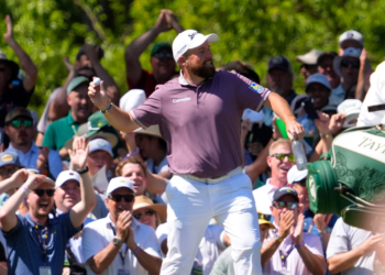 Shane Lowry celebrates after hitting a hole-in-one on the sixth hole during the third round of the Masters on April 11, 2026.