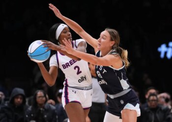 Alanna Smith guarding Rickea Jackson during a basketball game.