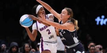 Alanna Smith guarding Rickea Jackson during a basketball game.