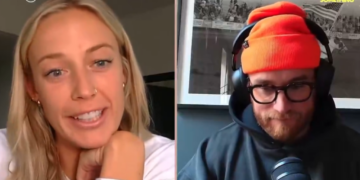 Two people, a blonde woman and a bearded man in a beanie and headphones, in a video call.
