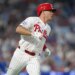 Philadelphia Phillies catcher JT Realmuto (10) runs to first after hitting a single against the Chicago Cubs in the fourth inning at Citizens Bank Park.