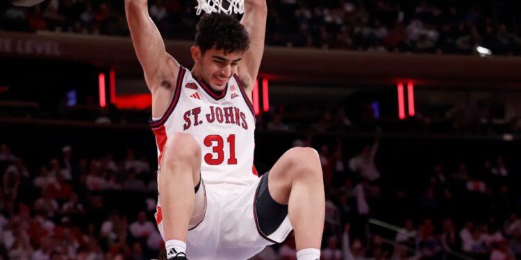 St. John's Lefteris Liotopoulos slams the ball.