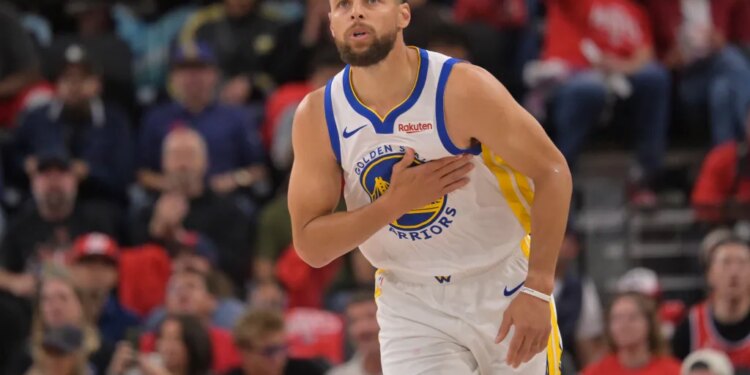 Stephen Curry, who scored a game-high 35 points, celebrates after hitting a 3-pointer during the Warriors' 126-121 win over the Clippers on April 15, 2026 in Inglewood, Calif.