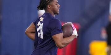 Notre Dame running back Jadarian Price runs a drill runs a drill during the school's NFL football pro day in South Bend, Ind., Tuesday, March 24, 2026. (AP Photo/Michael Conroy)