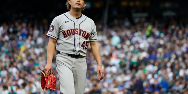 Houston Astros pitcher Tatsuya Imai (45) departs the mound during a pitching change.