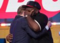 Kayden McDonald, right, reacts with NFL Commissioner Roger Goodell after being chosen by the Houston Texans with the 36th overall pick during the second round of the NFL football draft, Friday, April 24, 2026.