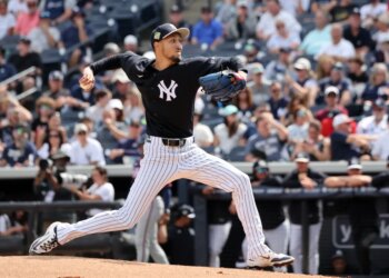Elmer Rodriguez pitching for the Yankees in spring training.