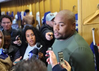 New York Giants defensive tackle Dexter Lawrence II #97, speaking to the media in front of his locker after practice at the New York Giants training facility in East Rutherford, New Jersey
