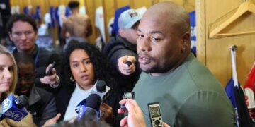New York Giants defensive tackle Dexter Lawrence II #97, speaking to the media in front of his locker after practice at the New York Giants training facility in East Rutherford, New Jersey
