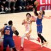 Knicks guard Jalen Brunson (11) goes up for a shot as Atlanta Hawks forward Jalen Johnson (1) gives chase during the fourth quarter.