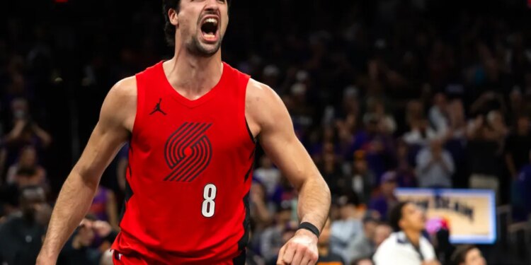 Deni Avdija, who scored 41 points, celebrates during the Trail Blazers 114-110 win over the Suns on April 14, 2026 in Phoenix.