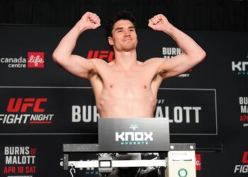 Mike Malott poses on the scale during the UFC Fight Night official weigh-ins on April 17, 2026 in Winnipeg, Manitoba.