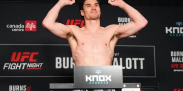 Mike Malott poses on the scale during the UFC Fight Night official weigh-ins on April 17, 2026 in Winnipeg, Manitoba.