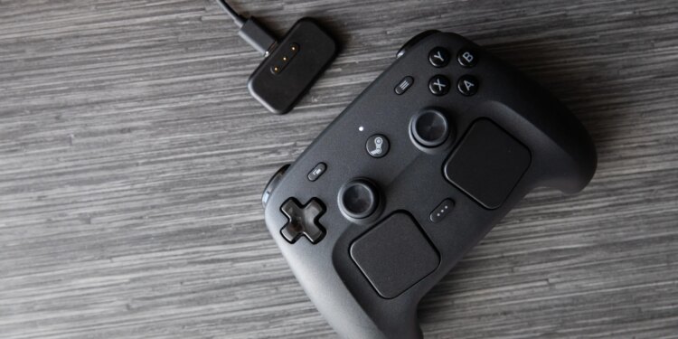 The Controller and the included puck for charging and connecting.