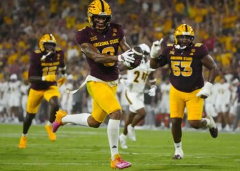 Arizona State wide receiver Jordyn Tyson scores a touchdown.