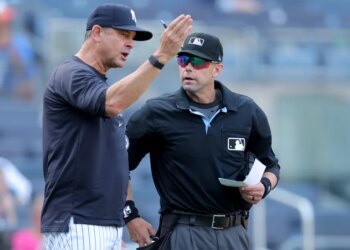 Aaron Boone argues with home plate umpire Will Little in the eighth inning before getting ejected for the first time this season in the Yankees' 11-4 blowout loss to the Angels on April 16, 2024.