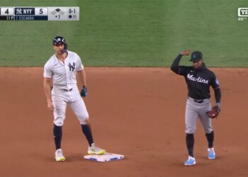 Giancarlo Stanton reacts after stealing a base during the Yankees' game April 4.
