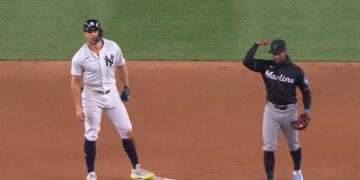 Giancarlo Stanton reacts after stealing a base during the Yankees' game April 4.