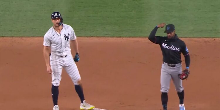 Giancarlo Stanton reacts after stealing a base during the Yankees' game April 4.