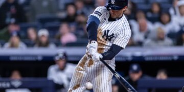 Yankees third baseman Ryan McMahon (19) reaches first base on an error during the third inning against the Miami Marlins at Yankee Stadium, Saturday, April 4, 2026, in Bronx, NY.