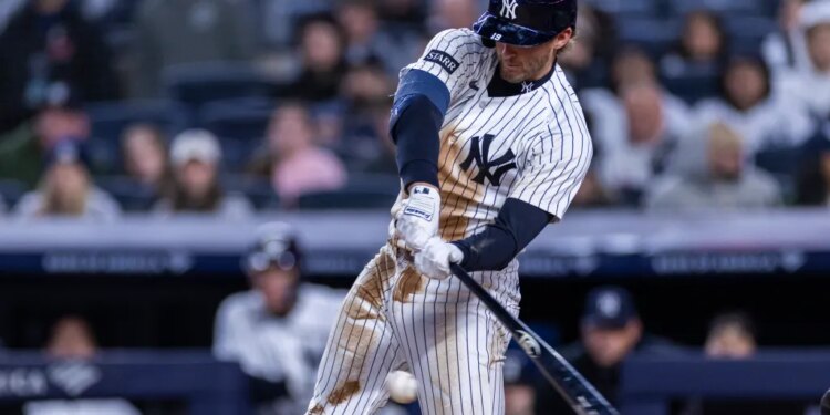 Yankees third baseman Ryan McMahon (19) reaches first base on an error during the third inning against the Miami Marlins at Yankee Stadium, Saturday, April 4, 2026, in Bronx, NY.