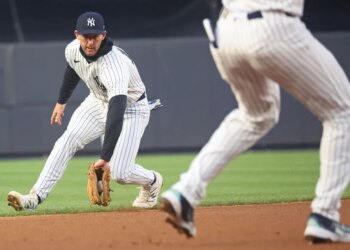 Ryan McMahon, who played his first game at shortstop in his career, fields a ground ball during the first inning of the Yankees' 3-2 loss to the A's on April 8, 2026 at the Stadium.