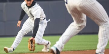 Ryan McMahon, who played his first game at shortstop in his career, fields a ground ball during the first inning of the Yankees' 3-2 loss to the A's on April 8, 2026 at the Stadium.