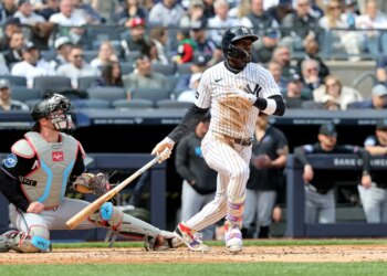 New York Yankees second baseman Jazz Chisholm Jr. (13) hits a double.