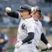 New York Yankees first baseman Ben Rice (22) celebrates with New York Yankees right fielder Aaron Judge (99) after he scores on his solo homer.