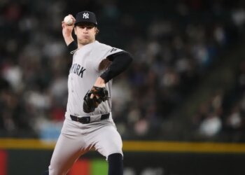 New York Yankees pitcher Cam Schlittler throws a pitch against the Seattle Mariners.