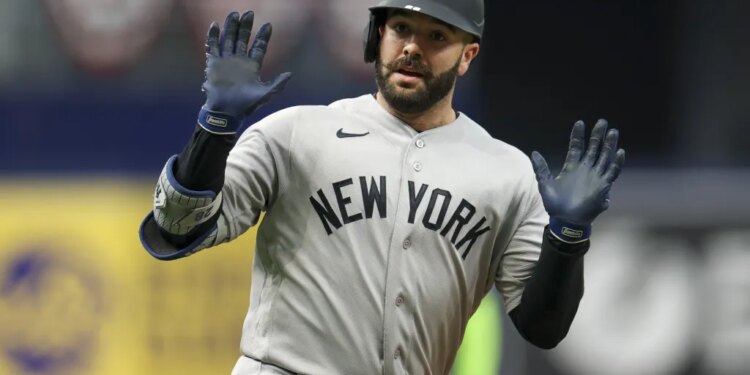 Austin Wells celebrates after hitting a solo home run in the second inning of the Yankees' 5-4, 10-inning loss to the Rays on April 11, 2026.